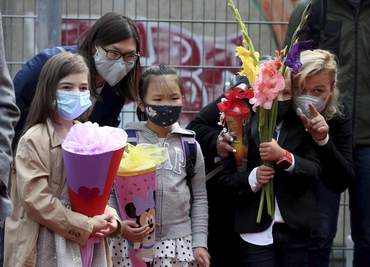 The Latest: Illinois university quarantines all student body