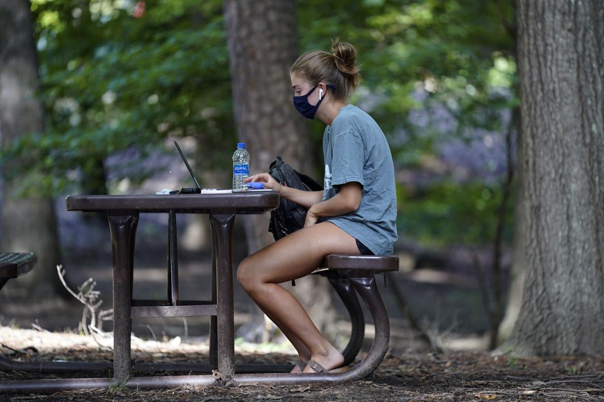 The Latest: Illinois university quarantines all student body